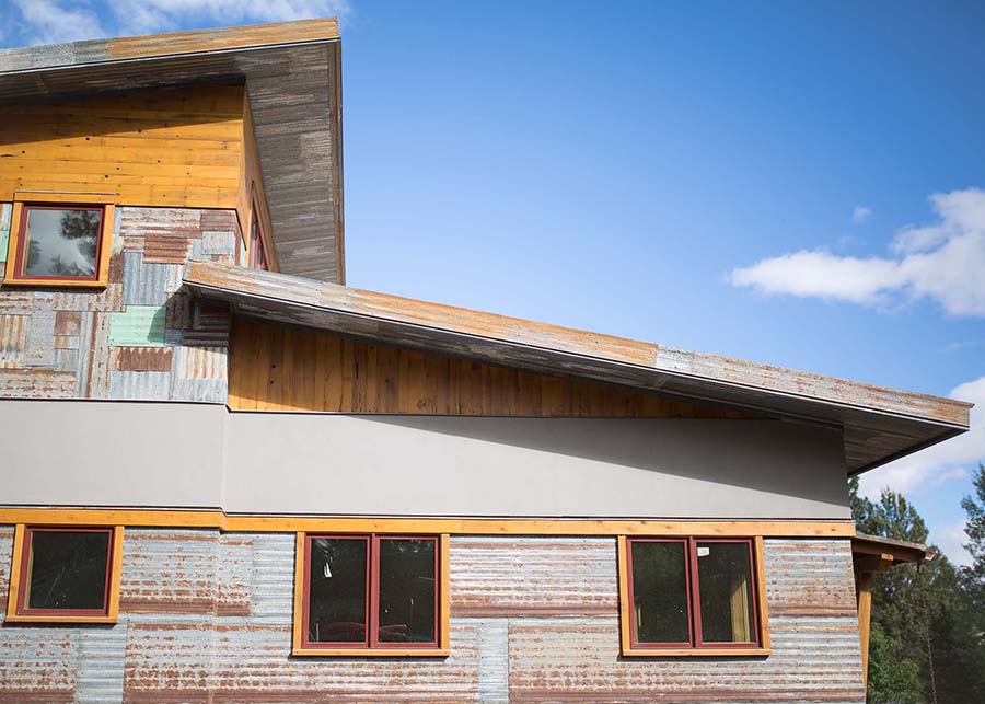 The exterior of the Fresno ave residence featuring oxidized tin siding